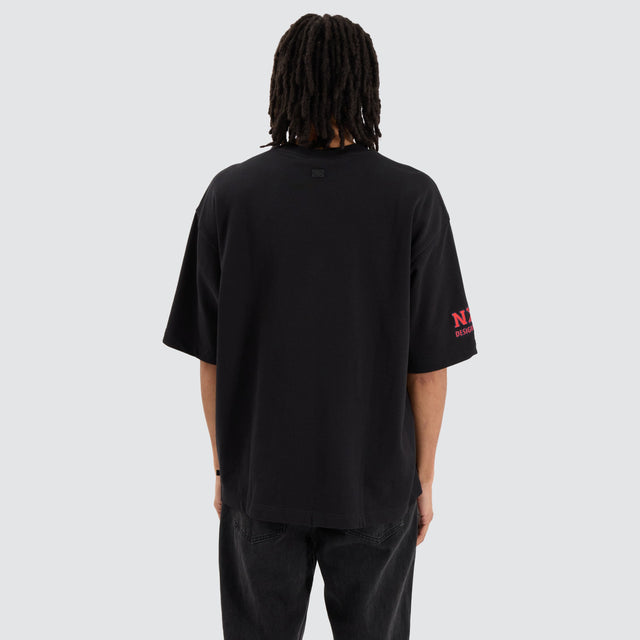 model wears Melbourne Demons AFL Mega Loopback Tee Jet Black T-Shirts Black - image 7