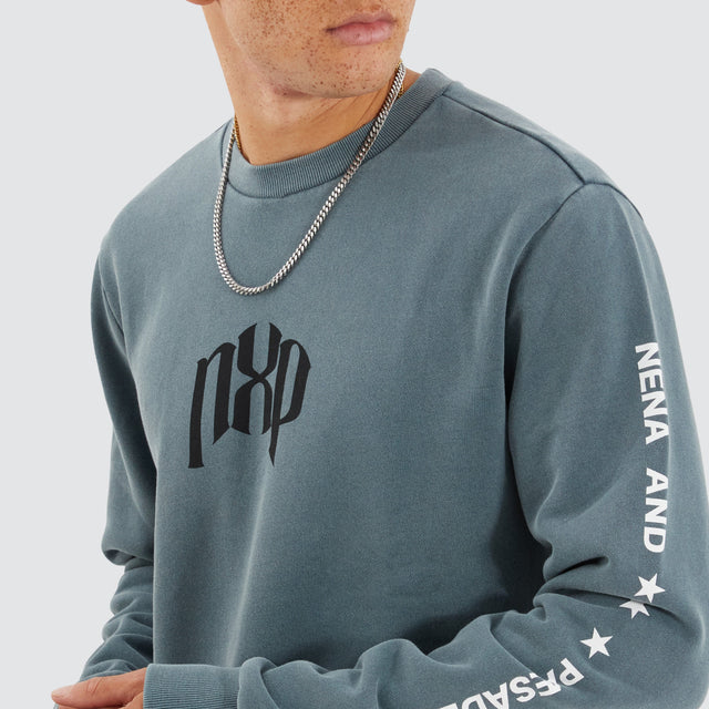 model wears Axis Dual Curved Sweater Pigment Stormy Weather Jumpers Teal - image 3