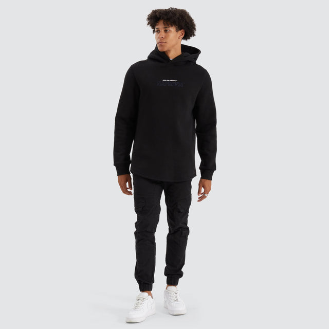 model wears Brodder Dual Curved Hoodie Jet Black Hoodies Black - image 5