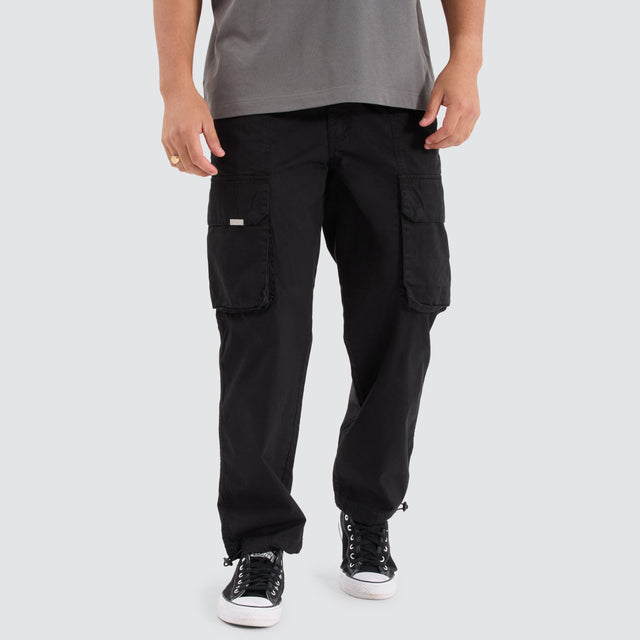 model wears C250 Tactical Cargo Pant Jet Black Pants Black - image 1