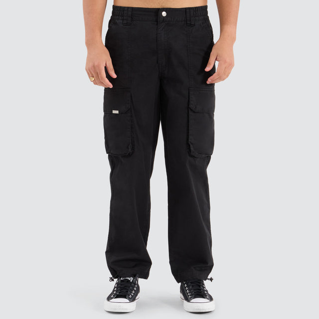 model wears C250 Tactical Cargo Pant Jet Black Pants Black - image 2