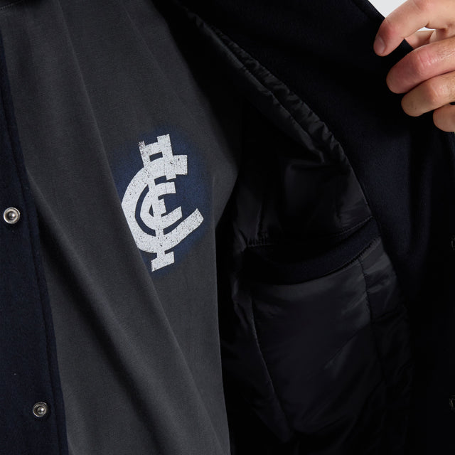 model wears Carlton Blues AFL Varsity Jacket Navy Jackets Blue - image 5
