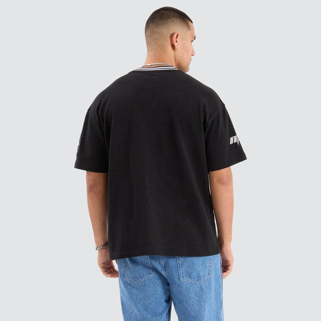 model wears Champion Loopback Raptor Tee Jet Black T-Shirts Black - image 2