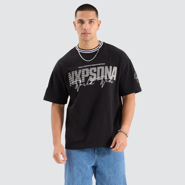 model wears Champion Loopback Raptor Tee Jet Black T-Shirts Black - image 1