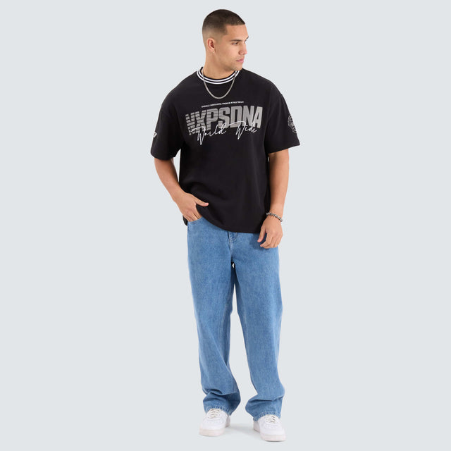 model wears Champion Loopback Raptor Tee Jet Black T-Shirts Black - image 4