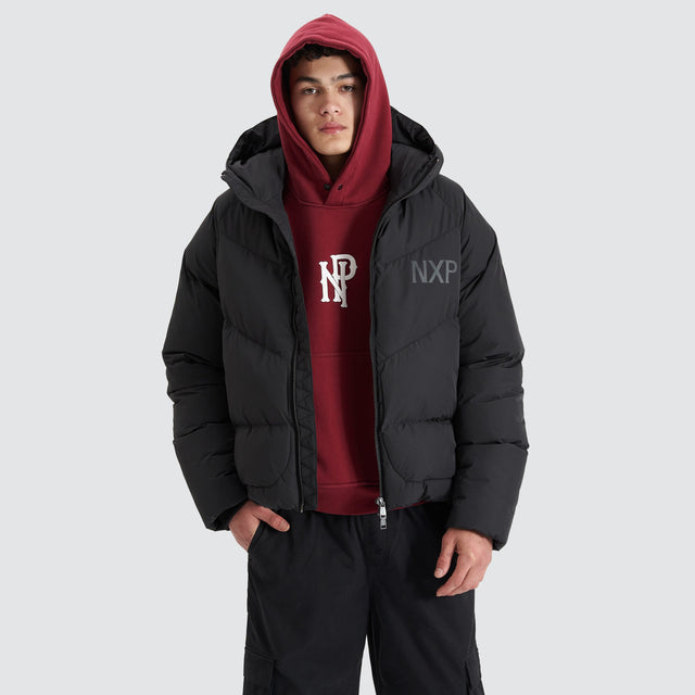 model wears Chrysler Raglan Puffer Jacket Jet Black Jackets Black - image 1