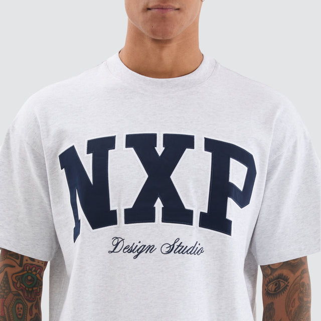 model wears College Raptor Tee Snow Marle T-Shirts White - image 2