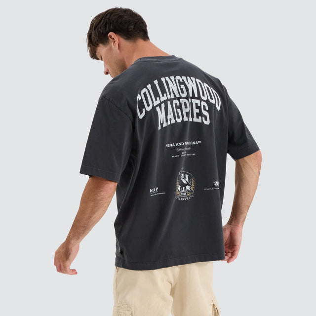 model wears Collingwood Magpies AFL Oversized Tee Pigment Black T-Shirts Black - image 1