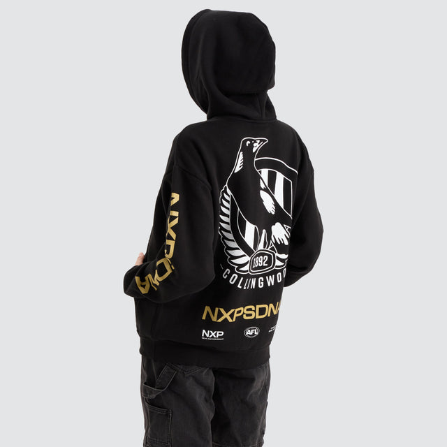 model wears Collingwood Magpies AFL Relaxed Hoodie Jet Black Hoodies Black - image 1