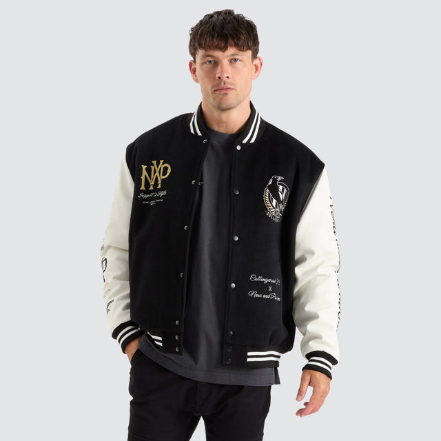 model wears Collingwood Magpies AFL Varsity Jacket Jet Black Jackets Black - image 1
