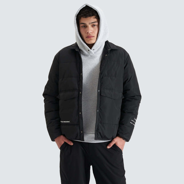 model wears Context Puffer Shirt Jet Black Jackets Black - image 1