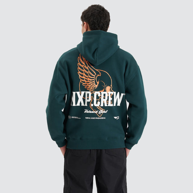 model wears Corbusian Heavy Box Fit Hoodie Bull Pine Hoodies Green - image 4