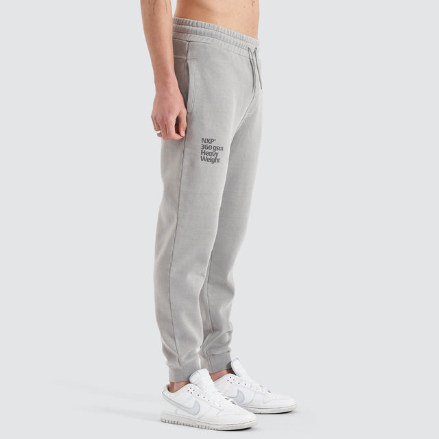 model wears Core Line Heavy Trackpant Pigment Alloy Trackpants Grey - image 6