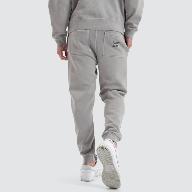 model wears Core Line Heavy Trackpant Pigment Alloy Trackpants Grey - image 3
