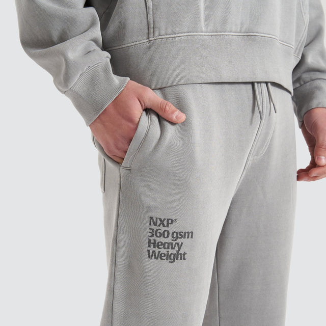 model wears Core Line Heavy Trackpant Pigment Alloy Trackpants Grey - image 4