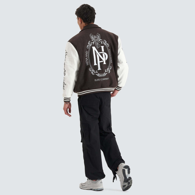 model wears Facade Varsity Jacket After Dark Jackets Brown - image 3