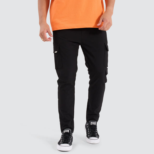 model wears S150 Slim Cargo Black Pants Black - image 1