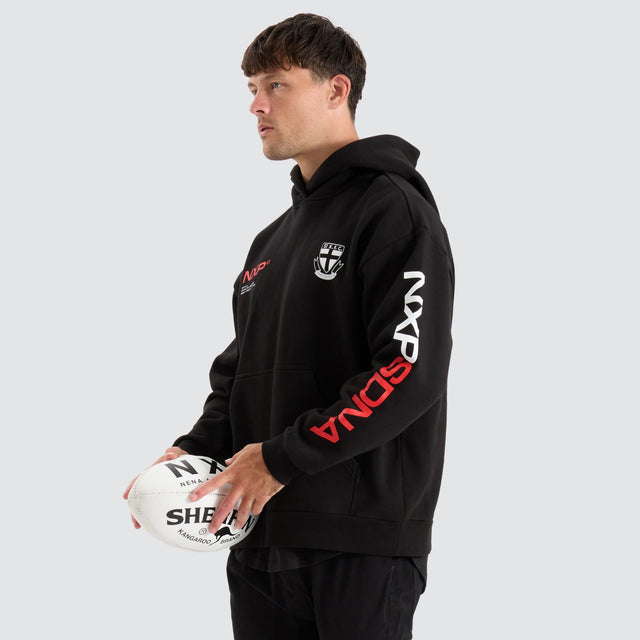 model wears St Kilda Saints AFL Relaxed Hoodie Jet Black Hoodies Black - image 2