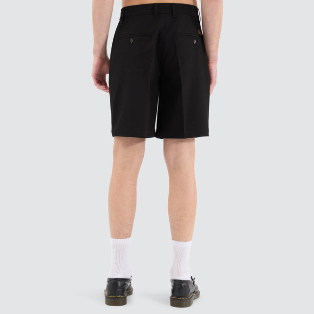 model wears Venture Pleated Dress Short Black Shorts Black - image 7