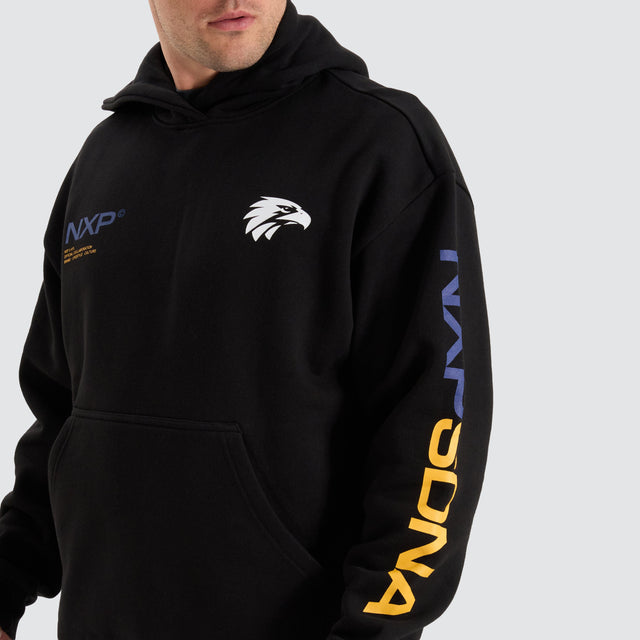 model wears West Coast Eagles AFL Relaxed Hoodie Jet Black Hoodies Black - image 3