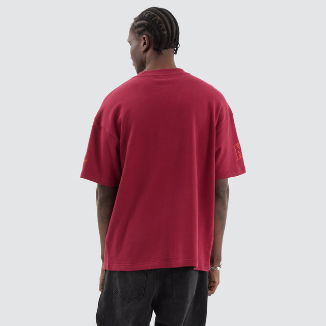 model wears Wings Loopback Raptor Tee Maroon T-Shirts Red - image 4