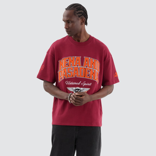 model wears Wings Loopback Raptor Tee Maroon T-Shirts Red - image 1