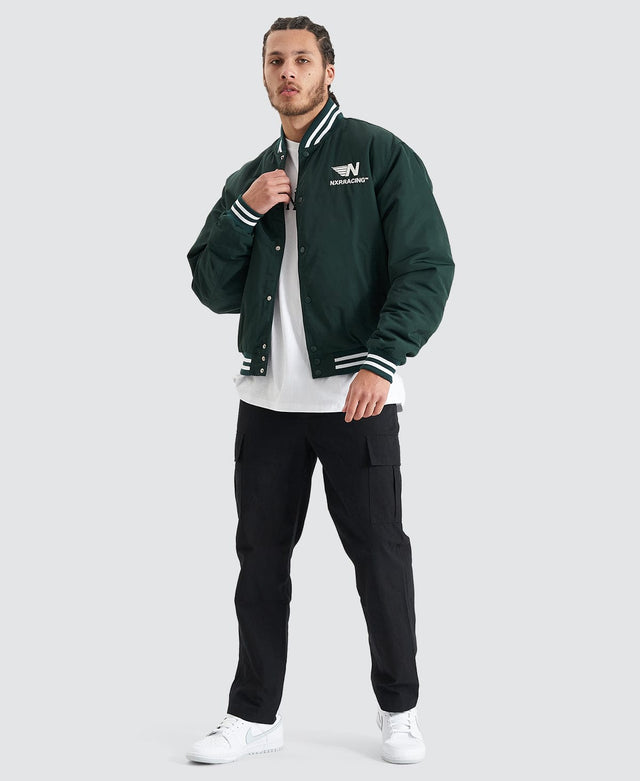 model wears Baseline Bomber Jacket Pine Grove Jackets Green - image 4