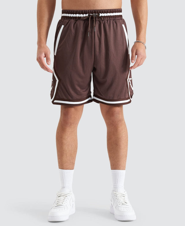 model wears Bishop Basketball Short Shaved Chocolate Shorts Brown - image 5
