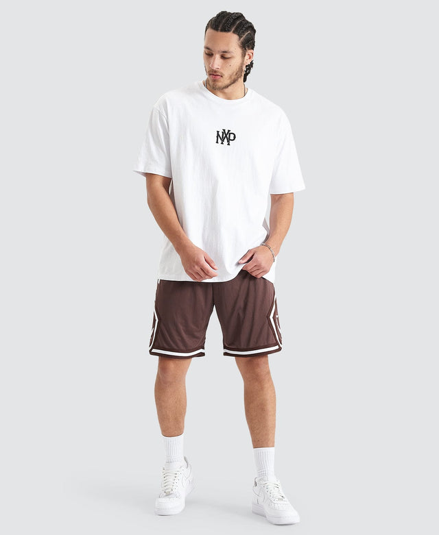 model wears Bishop Basketball Short Shaved Chocolate Shorts Brown - image 2