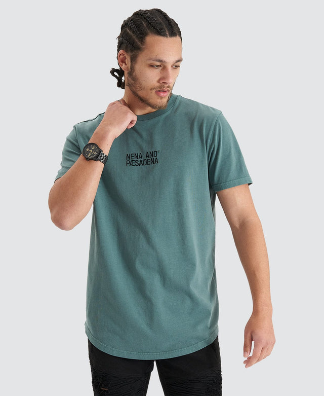model wears Blockade Dual Curved Tee Pigment Silver Pine T-Shirts Teal - image 1