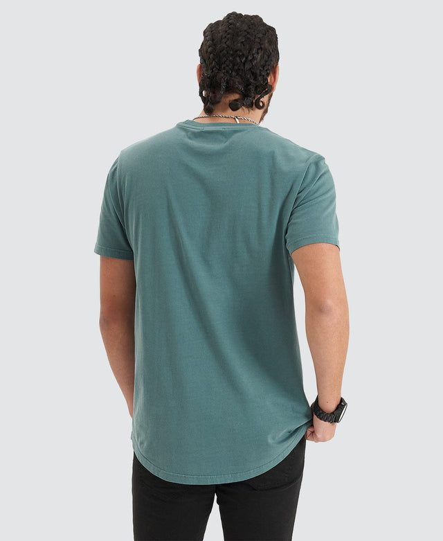 model wears Blockade Dual Curved Tee Pigment Silver Pine T-Shirts Teal - image 4