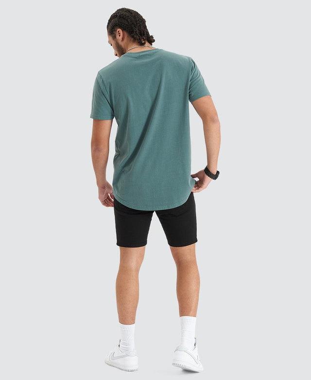 model wears Blockade Dual Curved Tee Pigment Silver Pine T-Shirts Teal - image 5