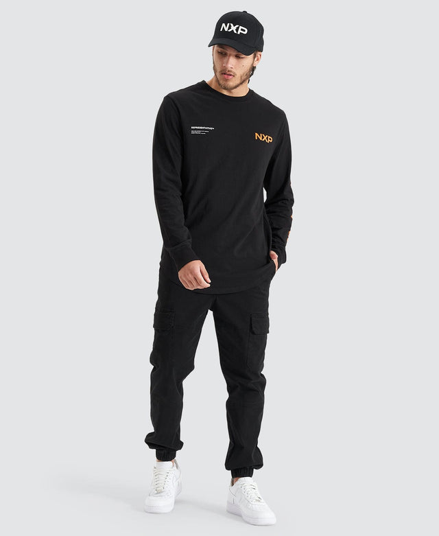 model wears Brevity Heavy Cape Back Longsleeve Tee Jet Black Longsleeve T-Shirts Black - image 5