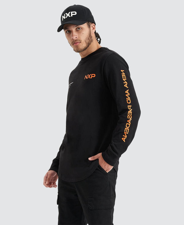 model wears Brevity Heavy Cape Back Longsleeve Tee Jet Black Longsleeve T-Shirts Black - image 2