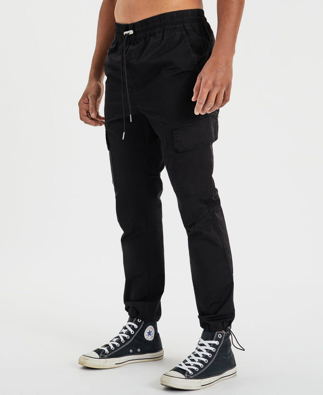 model wears Brigade Cargo Pants Black Pants Black - image 4