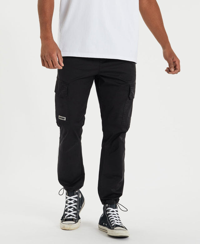 model wears Brigade Cargo Pants Black Pants Black - image 1