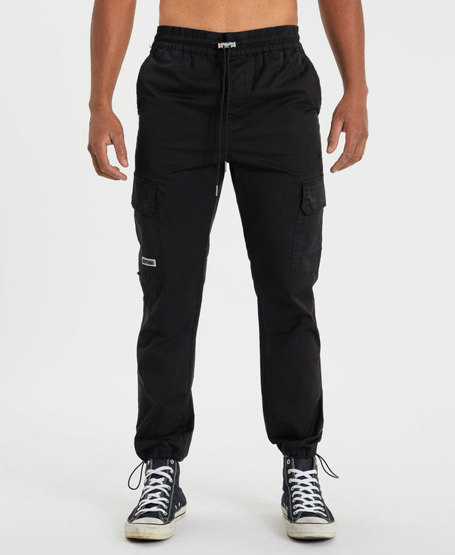 model wears Brigade Cargo Pants Black Pants Black - image 2