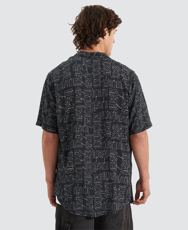 model wears Criminalisation Relaxed Short Sleeve Shirt Black Print Short Sleeve Shirts Black - image 2