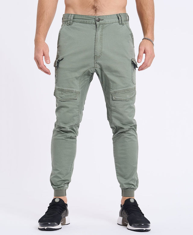 model wears Flight 2.0 Pants Oil Green Pants Green - image 4