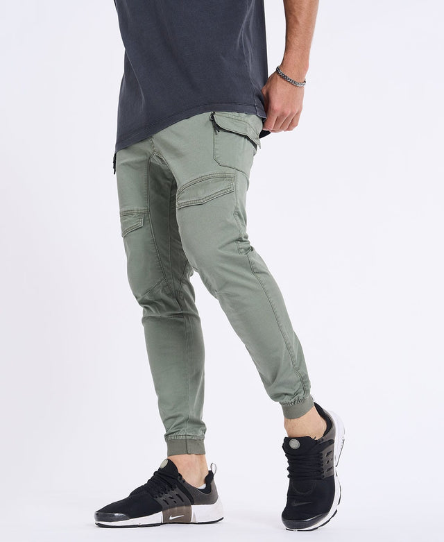 model wears Flight 2.0 Pants Oil Green Pants Green - image 1