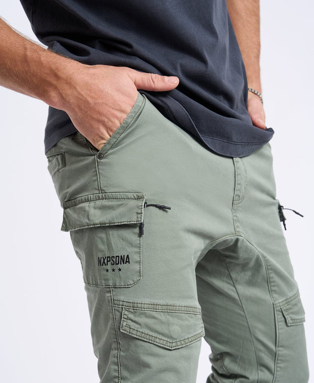 model wears Flight 2.0 Pants Oil Green Pants Green - image 2