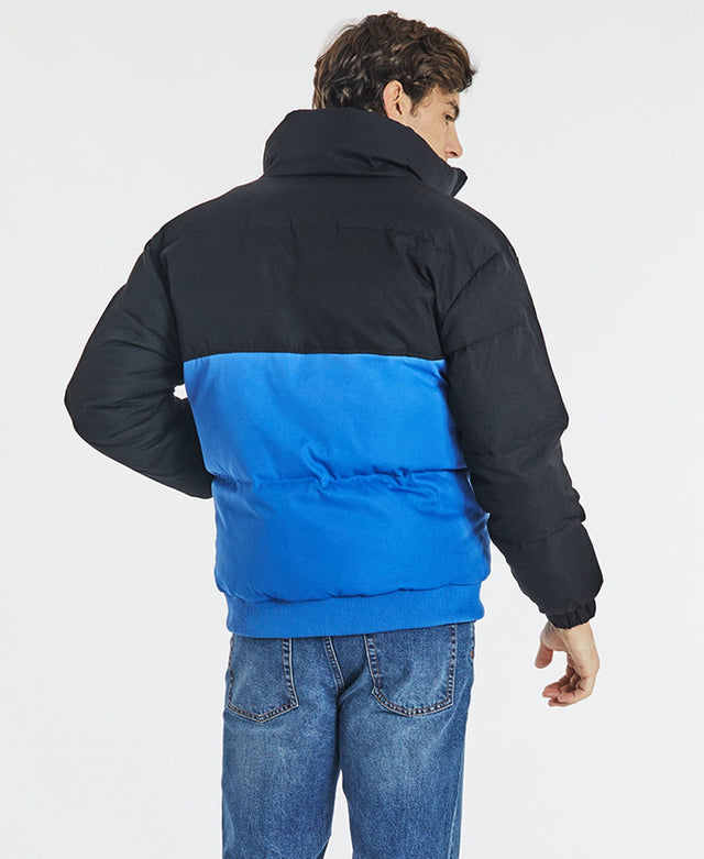 model wears Holstein Puffer Jacket Black/Blue Jackets Blue - image 2