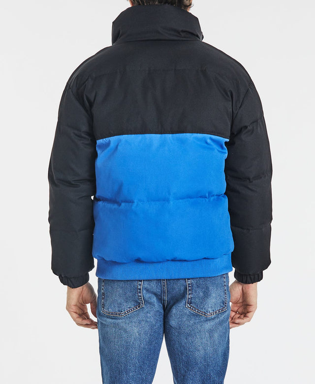 model wears Holstein Puffer Jacket Black/Blue Jackets Blue - image 5