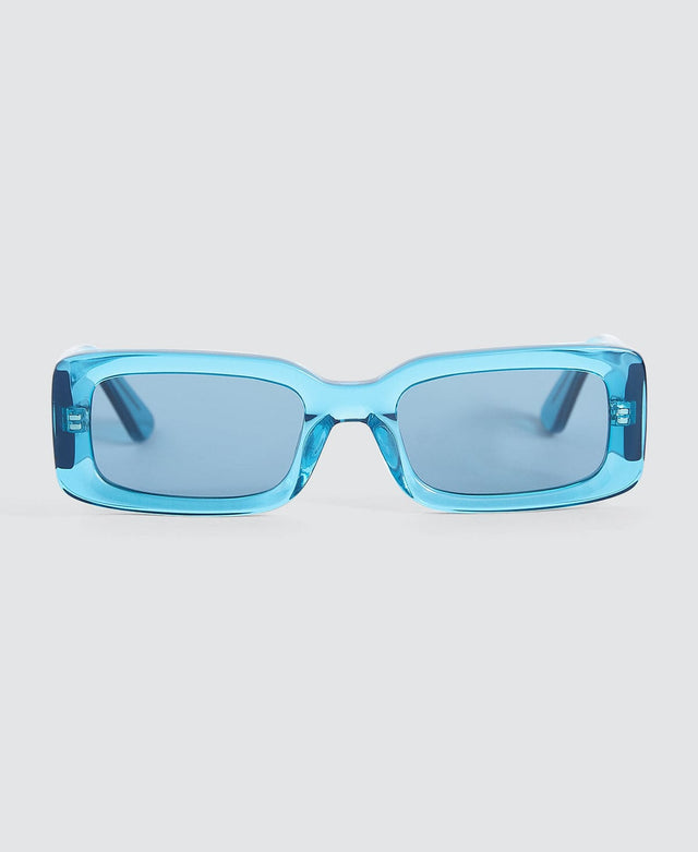 model wears Jungle Boy Sunglasses Transparent Blue Sunglasses Blue - image 1
