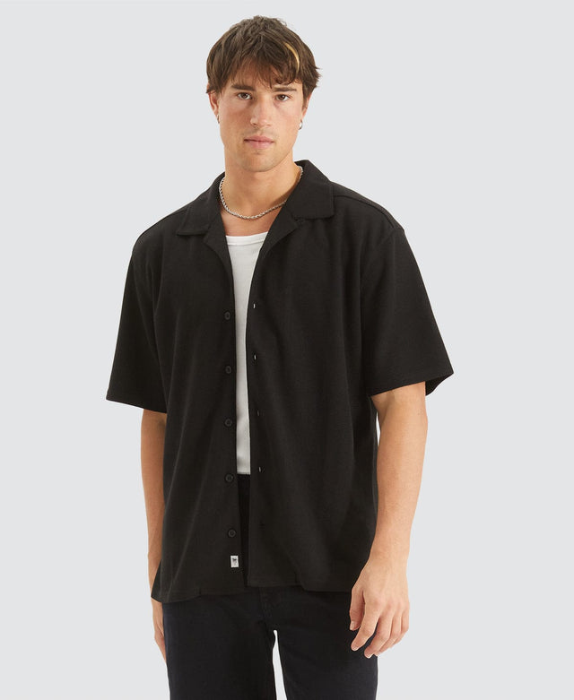 model wears Lagoon Cropped Resort Shirt Black Short Sleeve Shirts Black - image 1