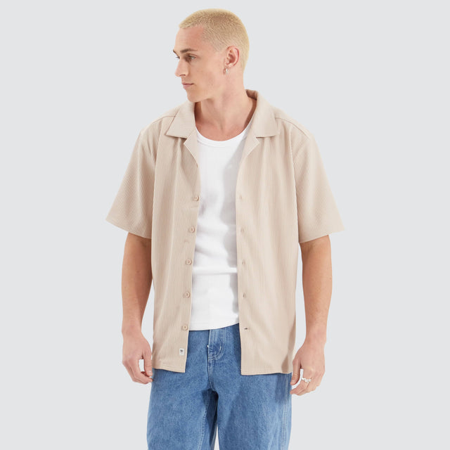 model wears Baroque Cropped Resort Shirt Sand Short Sleeve Shirts Cream - image 1