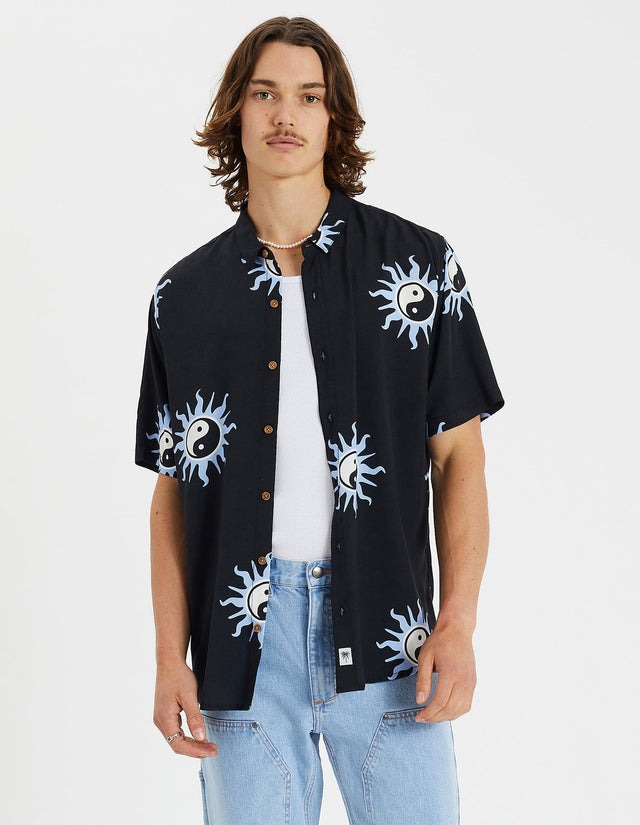 model wears Charmed Party Shirt Easter Egg Print Short Sleeve Shirts Black - image 1
