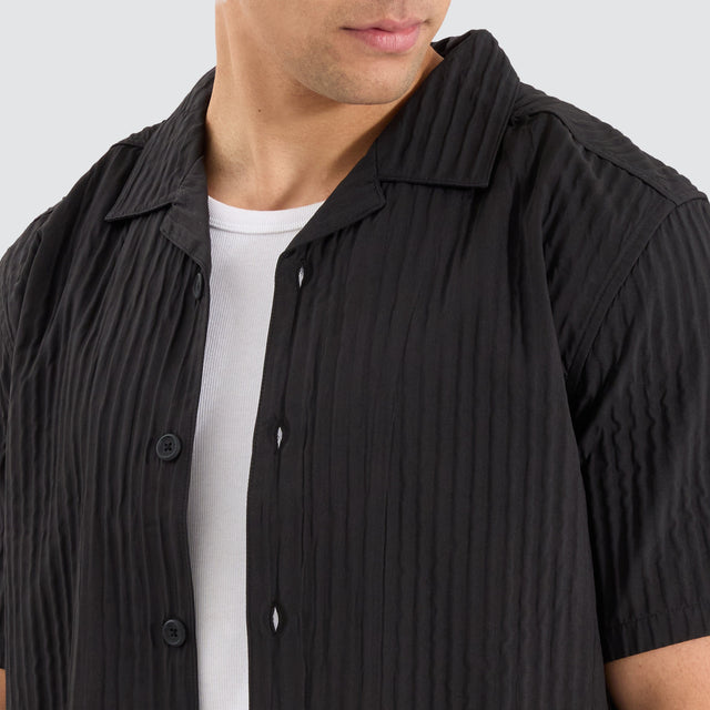 model wears Pleated Resort Crop Shirt Black Short Sleeve Shirts Black - image 2