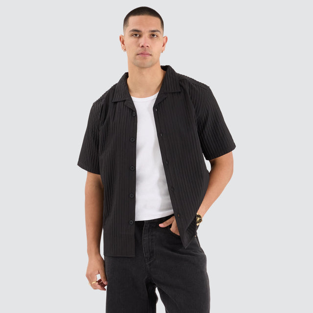 model wears Pleated Resort Crop Shirt Black Short Sleeve Shirts Black - image 1