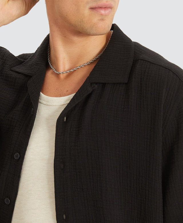 model wears Psych Cropped Resort Shirt Black Short Sleeve Shirts Black - image 2